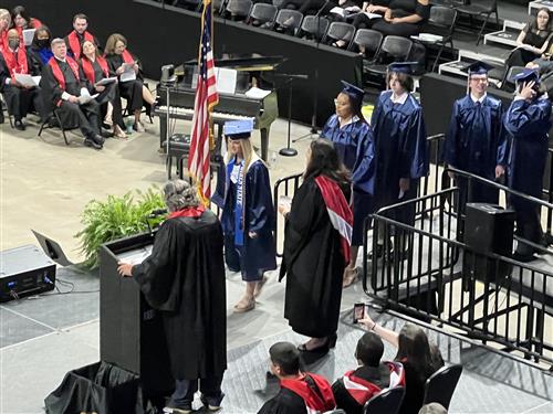 student from Bob Jones getting diploma